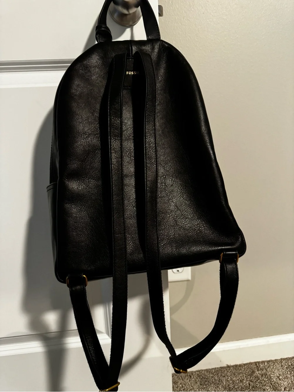 Fossil Black Leather Backpack with Gold Zip Accent
